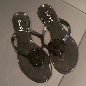 Black flat sandals with flower